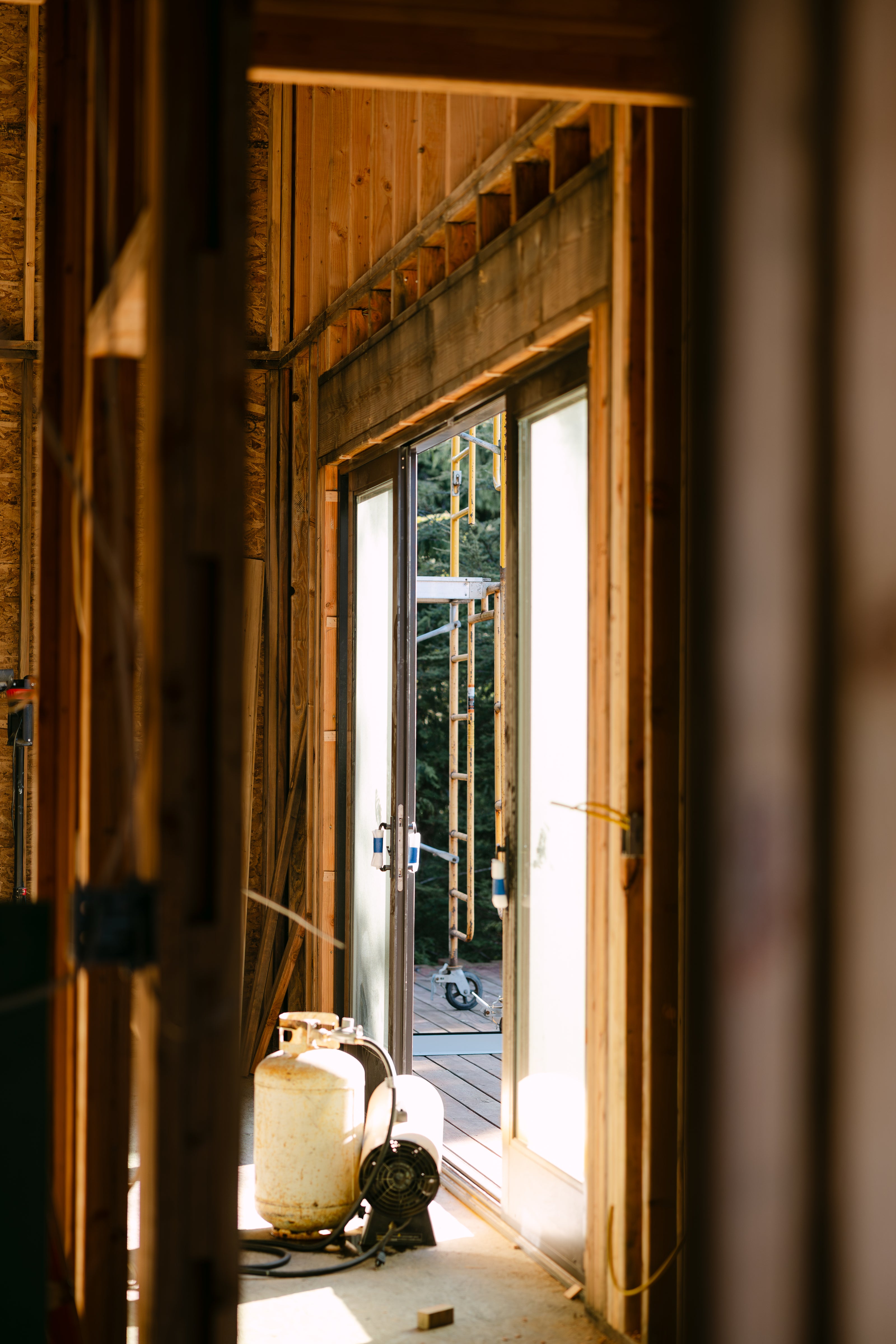 Wooden construction with new sliding glass door