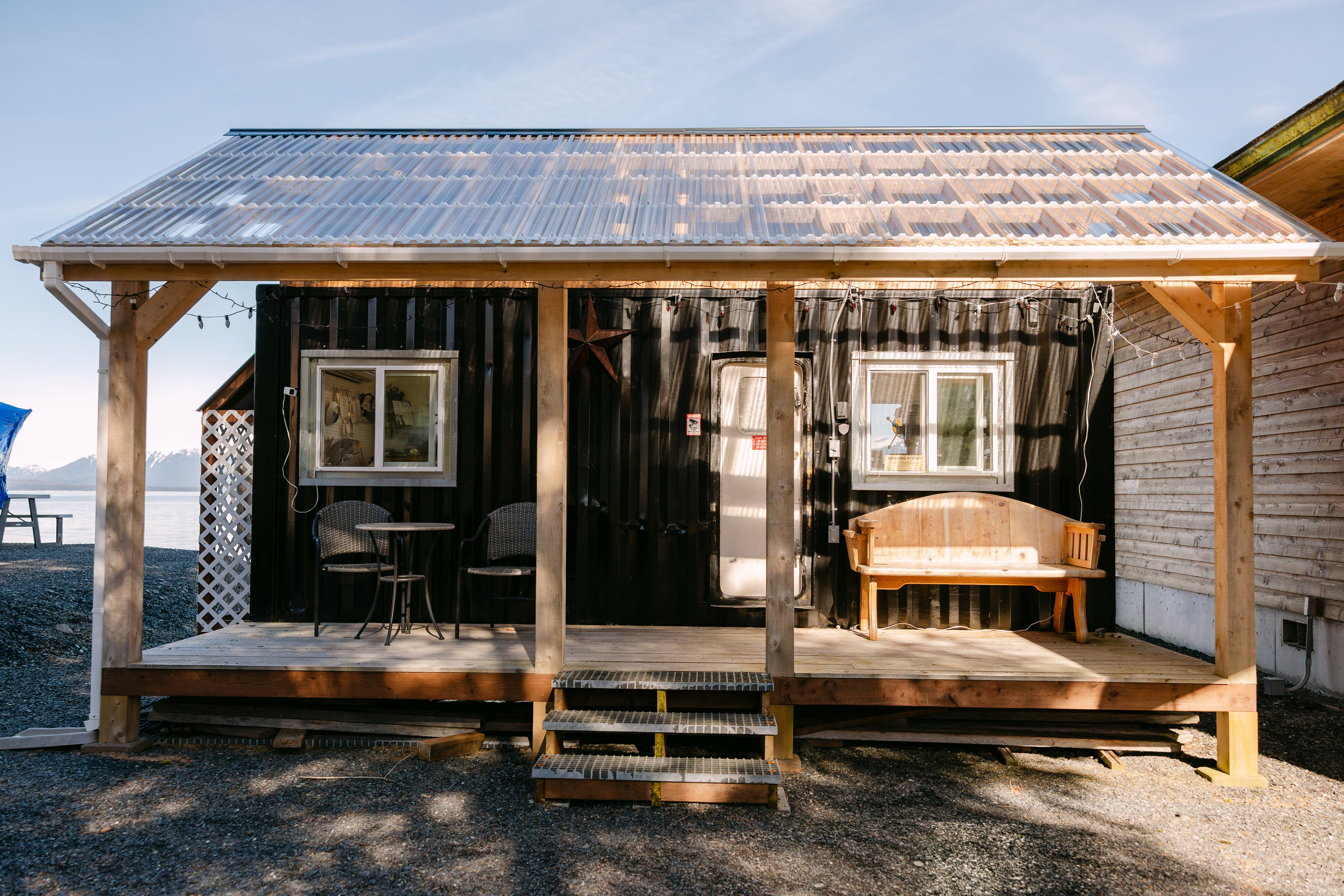 modern tiny home with a front porch area