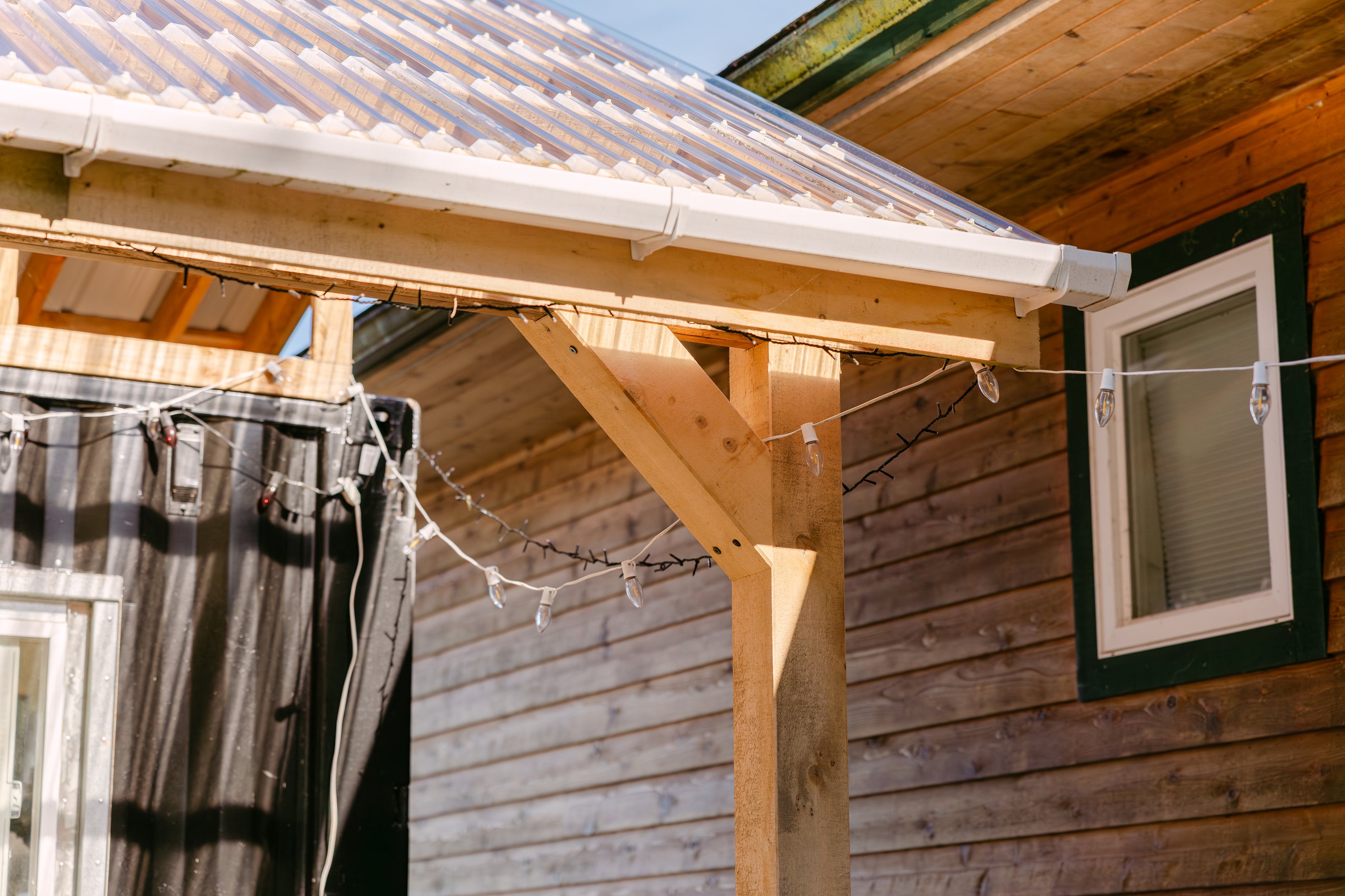 wooden post and beam structure supporting a roof