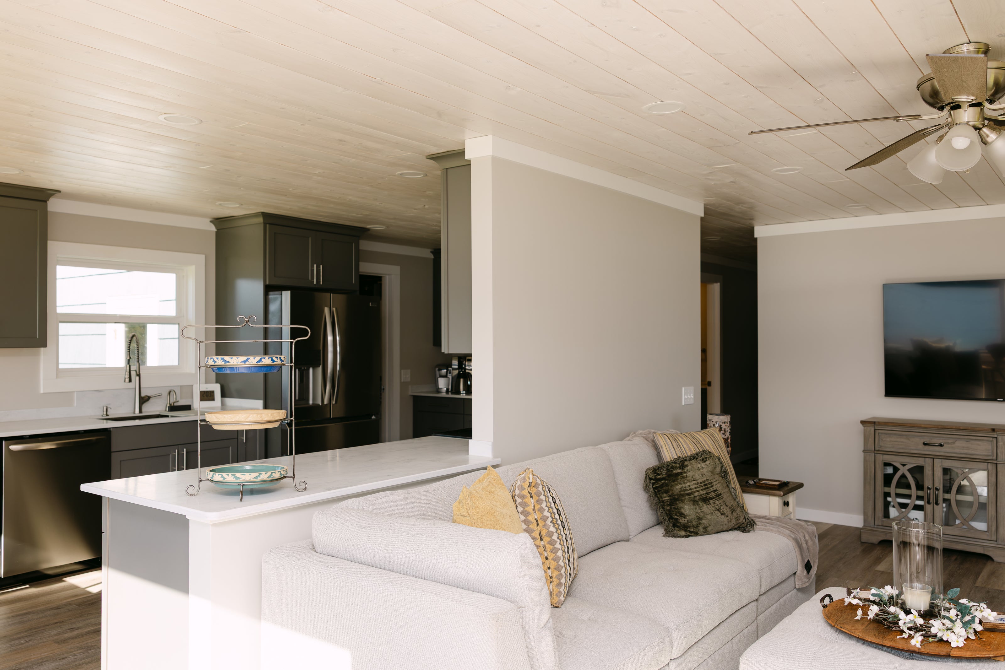 Beautiful living area with view of kitchen 