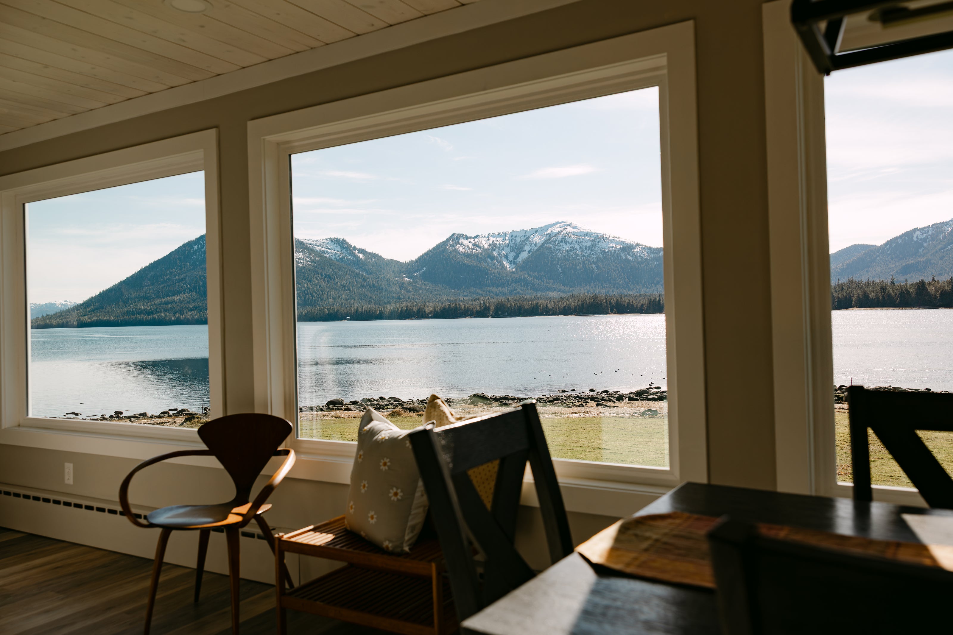 scenic water & mountain view from inside a room