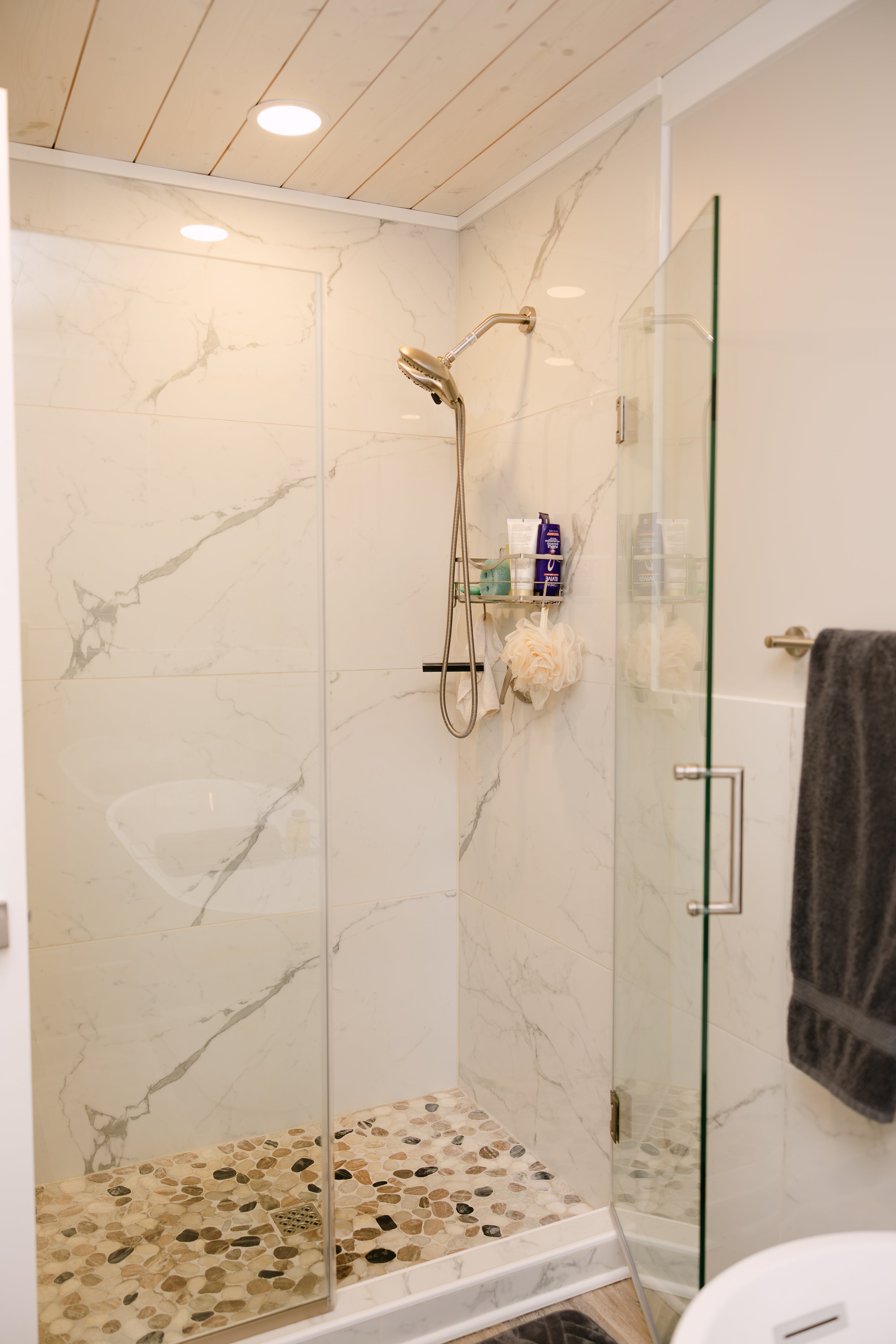 modern bathroom featuring a frameless glass shower