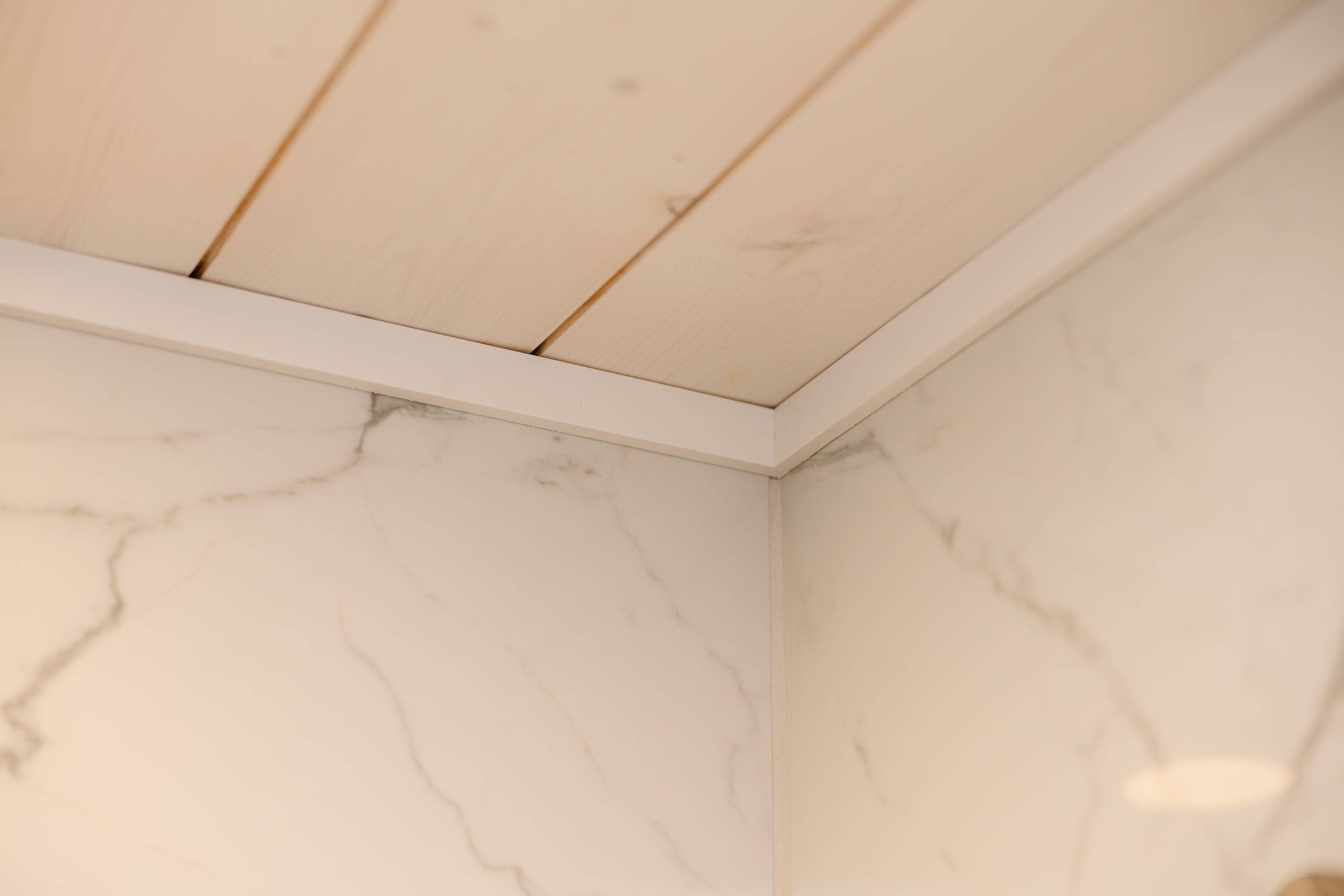 corner of a room, the intersection of a wall and a ceiling