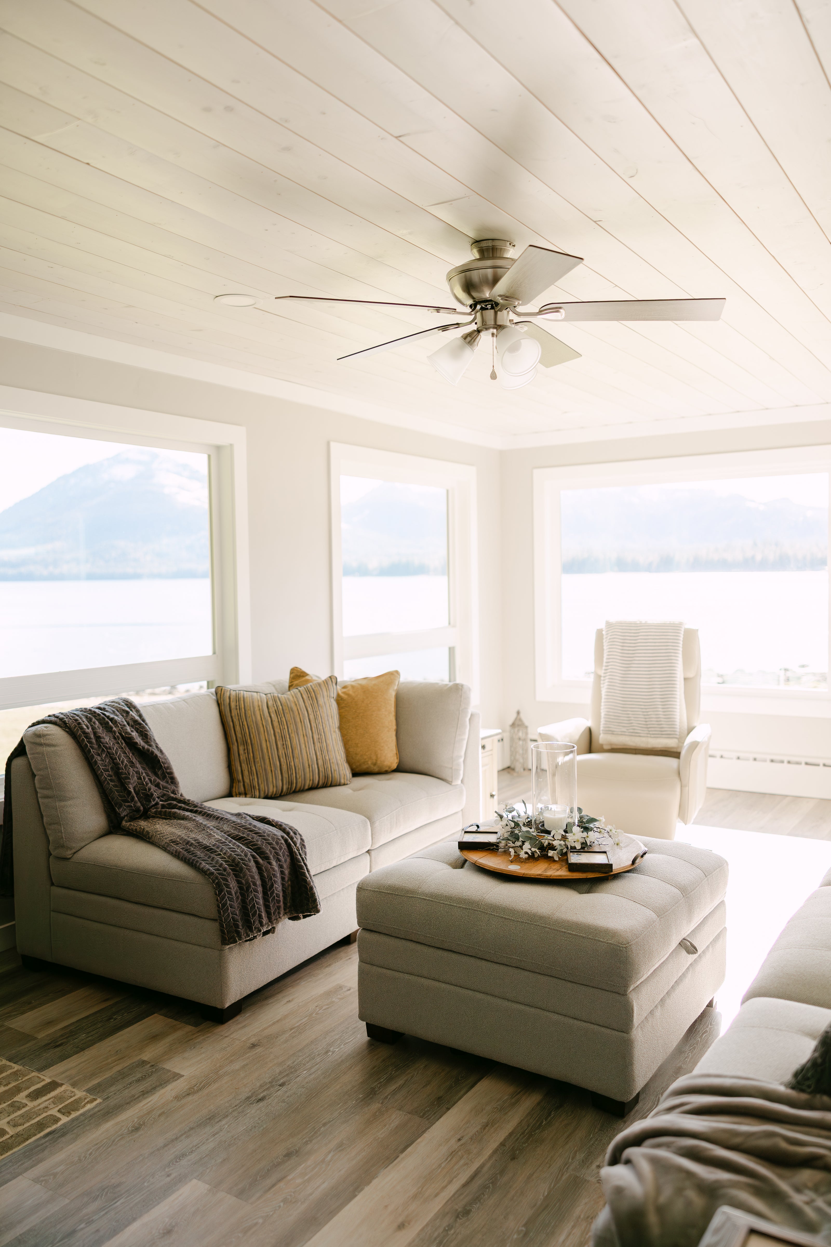 bright living room with sectional sofa 