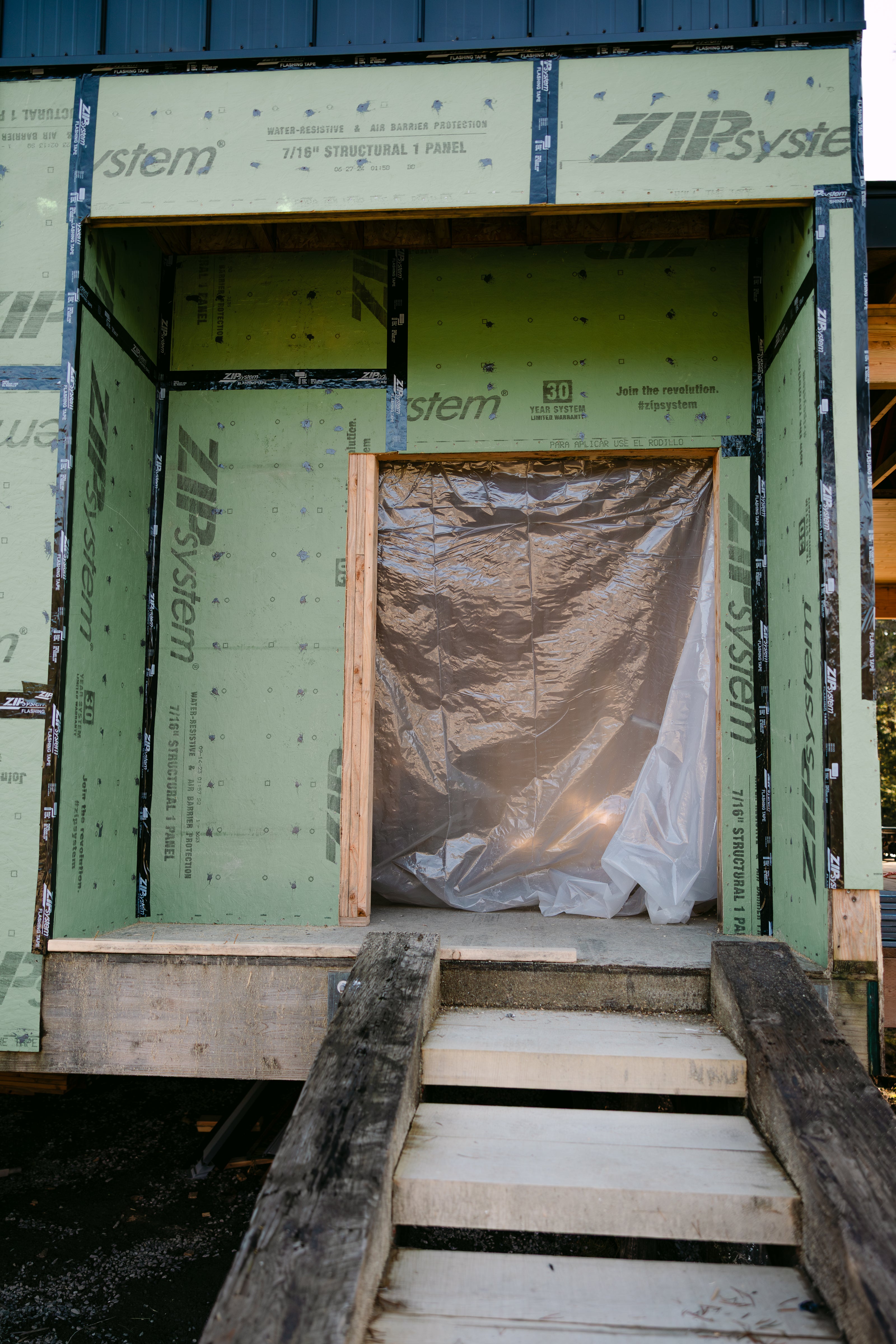 Wooden stairs construction for a wooden house 