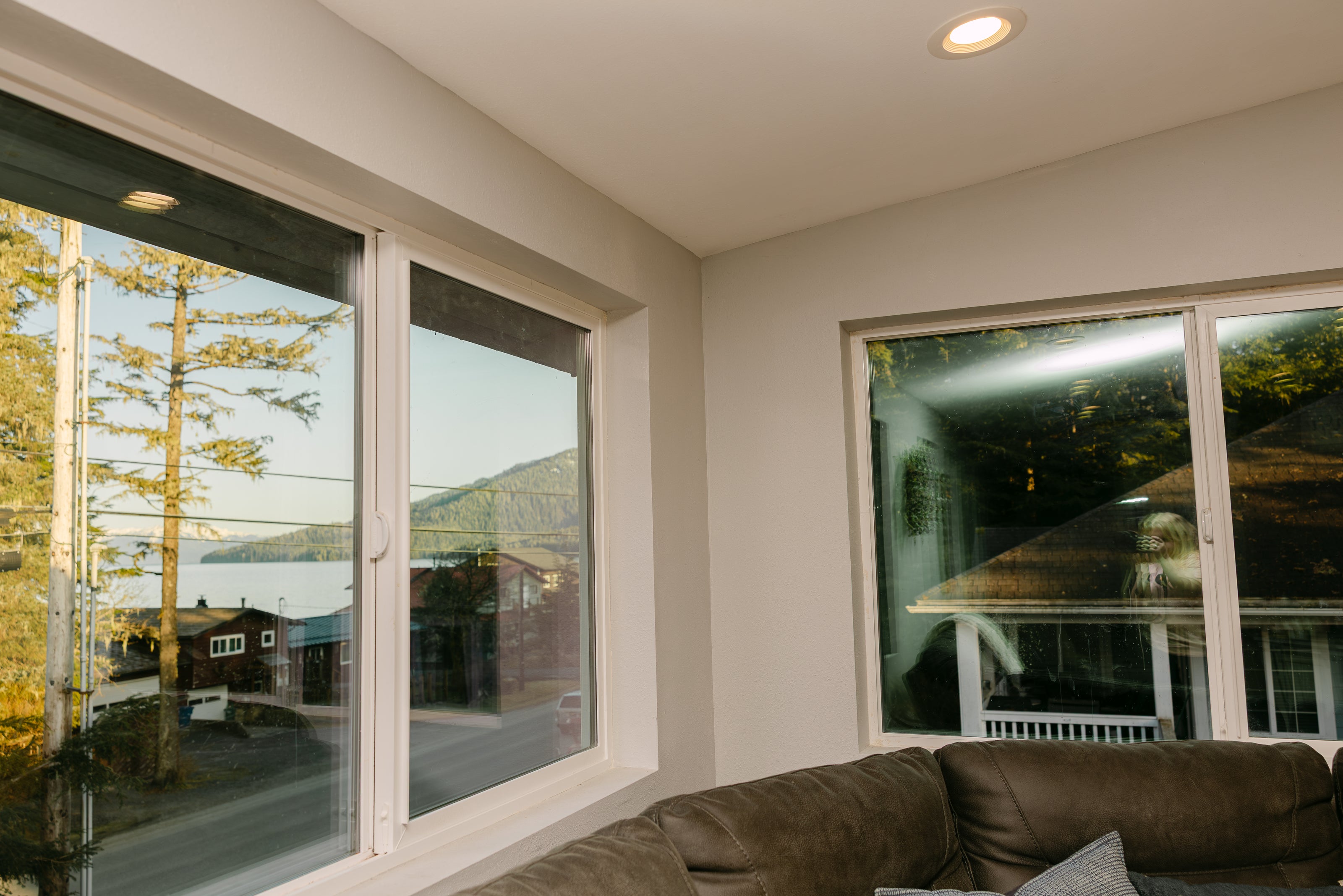 Interior of a room featuring large windows 